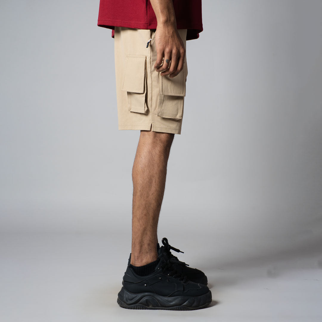 BEIGE MULTI FLAP SHORTS